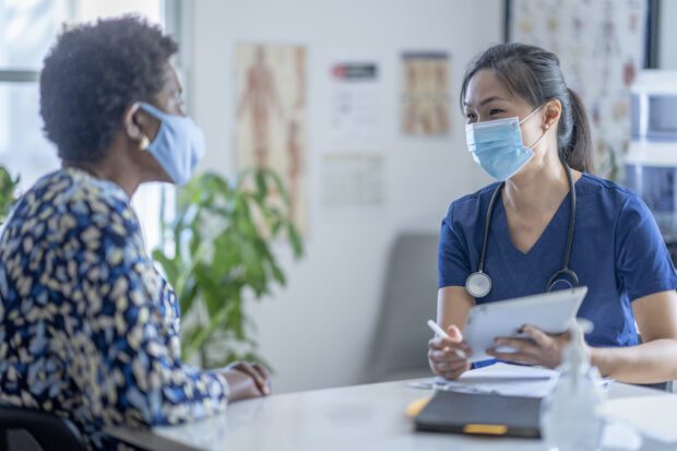 Female doctor meeting patient